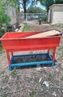 RED STEEL ROLLER BIN