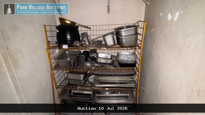 ASSORTED CATERING KITCHENWARE AND UTENSILS COMPRISING STAINLESS STEEL FOOD PANS, OVEN TRAYS, SERVING DISHES, LIDS, FOIL CONTAINERS, GRATER, BLACK COOKING POT AND LOOSE UTENSILS, STORED ON YELLOW METAL RACK ? USED CONDITION.