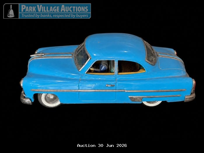 VINTAGE BLUE TIN MODEL CAR WITH CHROME-STYLE DETAILING