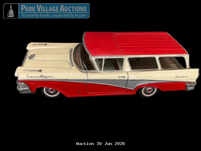 FAIRLANE VINTAGE RED AND CREAM RANCH WAGON TIN MODEL CAR WITH CLASSIC DETAILING