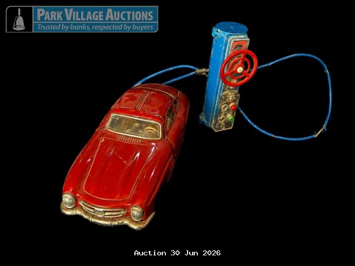 MERCEDES-BENZ CAR WITH A BLUE REMOTE CONTROL AND CABLE