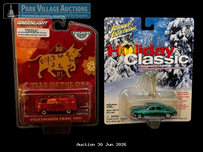 TWO PACKAGED COLLECTIBLE MODEL CARS, INCLUDING A VOLKSWAGEN PANEL VAN AND A JOHNNY LIGHTNING HOLIDAY CLASSIC ORNAMENT CAR.