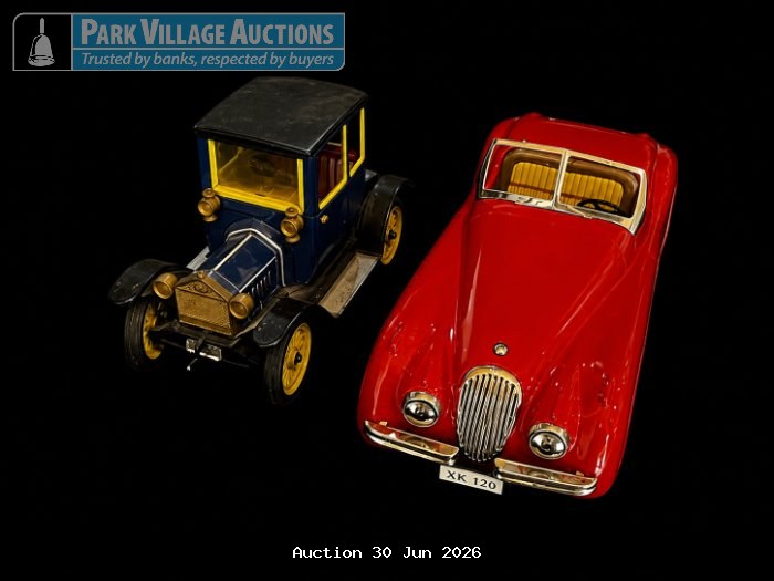 TWO VINTAGE TOY CARS, INCLUDING A BLUE FORD SCHUCO & A RED SPORTS CAR XK 120