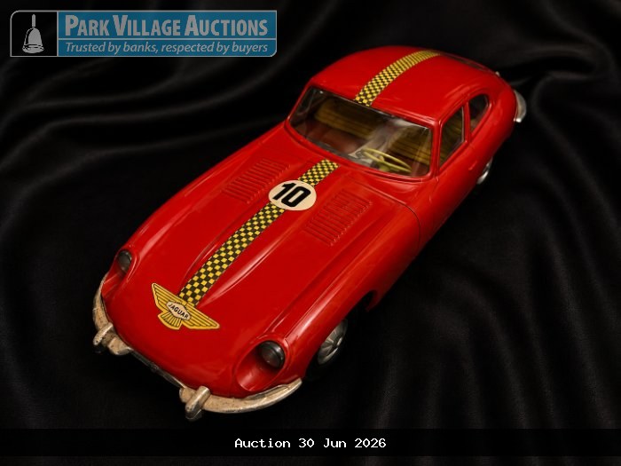 RED VINTAGE JAGUAR RACING MODEL CAR WITH NUMBER 10 AND CHECKERED STRIPE