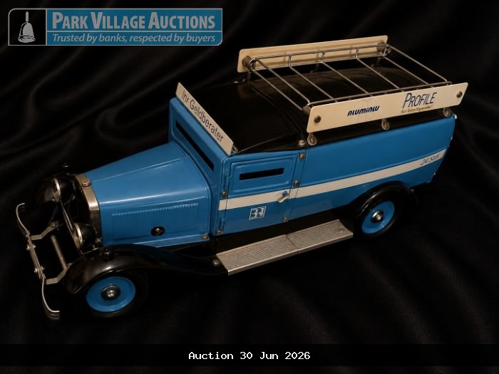 DAS WIRTSCHAFTSMAGSZIN BLUE TRUCK WITH ROOF RACK