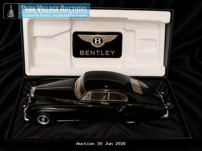 BOXED BLACK BENTLEY MODEL CAR WITH BRANDED PRESENTATION CASE AND LUXURY DETAILING.