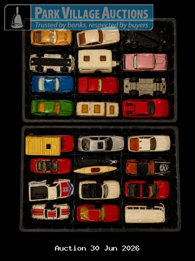 BLUE MATCHBOX CARRY CASE FOR COLLECTION OF ASSORTED TOY CARS AND VEHICLES STORED IN TWO BLACK DISPLAY TRAYS