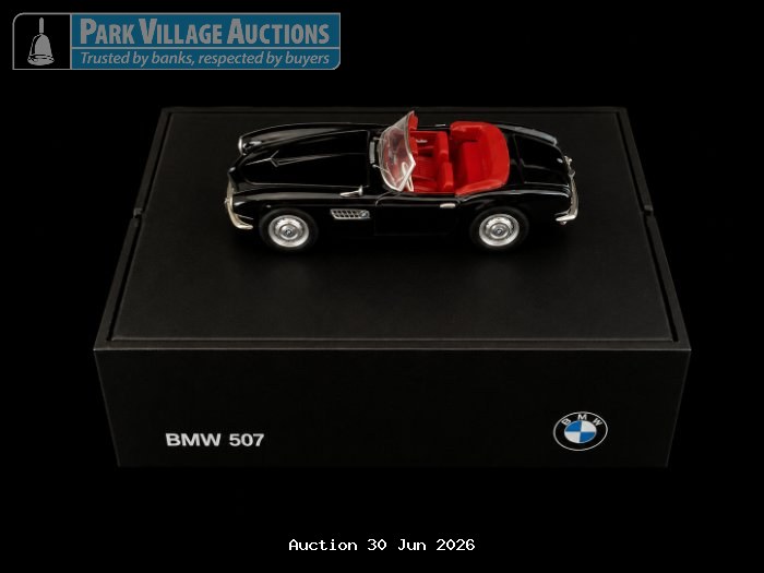 BMW 507 BLACK DIE-CAST CONVERTIBLE MODEL WITH RED INTERIOR, DISPLAYED ON A BRANDED BMW PRESENTATION BASE