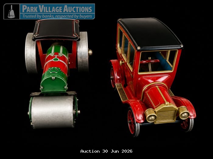 TWO VINTAGE-STYLE TIN TOY VEHICLES, INCLUDING A GREEN ROAD ROLLER AND RED CLASSIC CARRIAGE-STYLE CAR