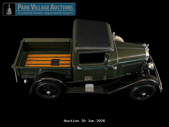 1931 FORD MODEL A, DARK GREEN VINTAGE-STYLE DIE-CAST PICKUP TRUCK MODEL WITH BLACK ROOF, WOODEN-STYLE LOAD BED AND CHROME DETAILING