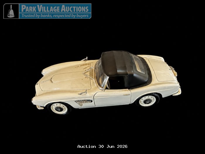 BMW 507 CREAM DIE-CAST BMW 507-STYLE CONVERTIBLE MODEL WITH BLACK SOFT-TOP ROOF, CHROME DETAILING AND VISIBLE AGE-RELATED WEAR