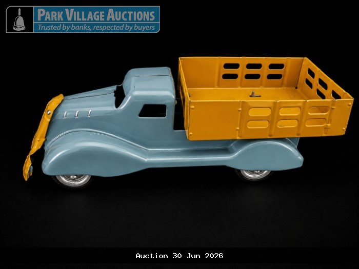 LIGHT BLUE VINTAGE-STYLE TIN TRUCK MODEL WITH YELLOW FRONT GRILLE GUARD AND YELLOW OPEN CARGO BED,