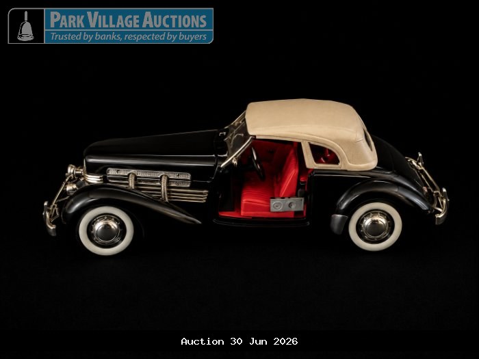 1937 CORD 812 SUPERCHARGED, BLACK VINTAGE-STYLE DIE-CAST CONVERTIBLE COUP MODEL WITH CREAM SOFT-TOP, RED INTERIOR, CHROME DETAILING AND WHITEWALL TYRES