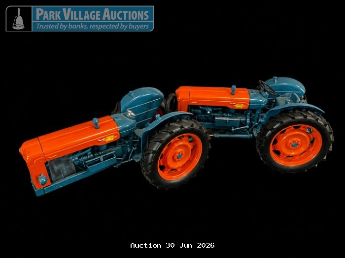 TWO BLUE AND ORANGE DIE-CAST TRACTOR MODELS
