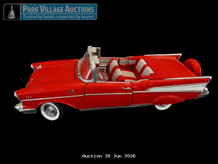 ERTL '57 CHEVROLET BEL AIR RED CHEVROLET BEL AIR-STYLE DIE-CAST CONVERTIBLE MODEL WITH WHITEWALL TYRES, CHROME DETAILING AND RED-AND-WHITE INTERIOR,