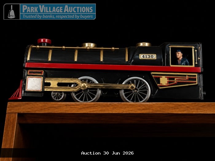 BLACK VINTAGE-STYLE TIN LOCOMOTIVE MODEL WITH RED AND GOLD DETAILING, DRIVER FIGURE AND NUMBER 4130