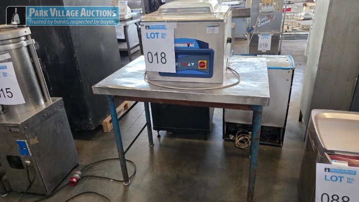 HENKOVAC VACUUM SEALER ON TABLE