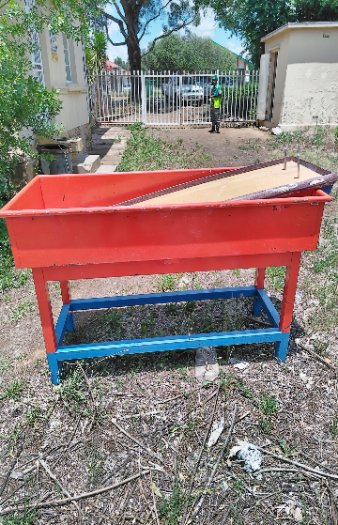 RED STEEL ROLLER BIN
